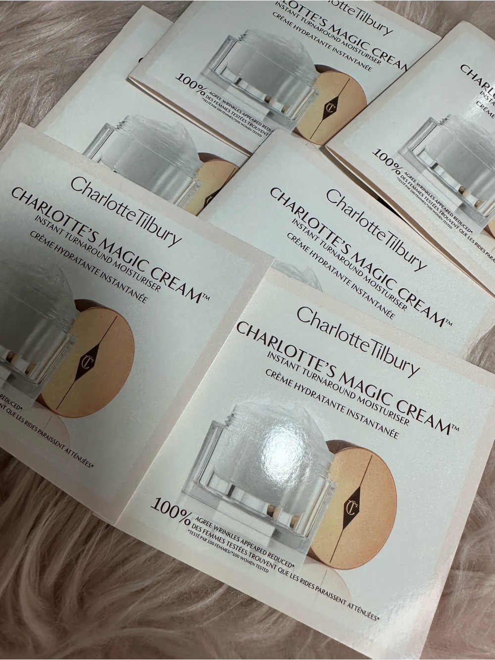 Charlotte Tilbury magic cream and Huda Beauty lashes